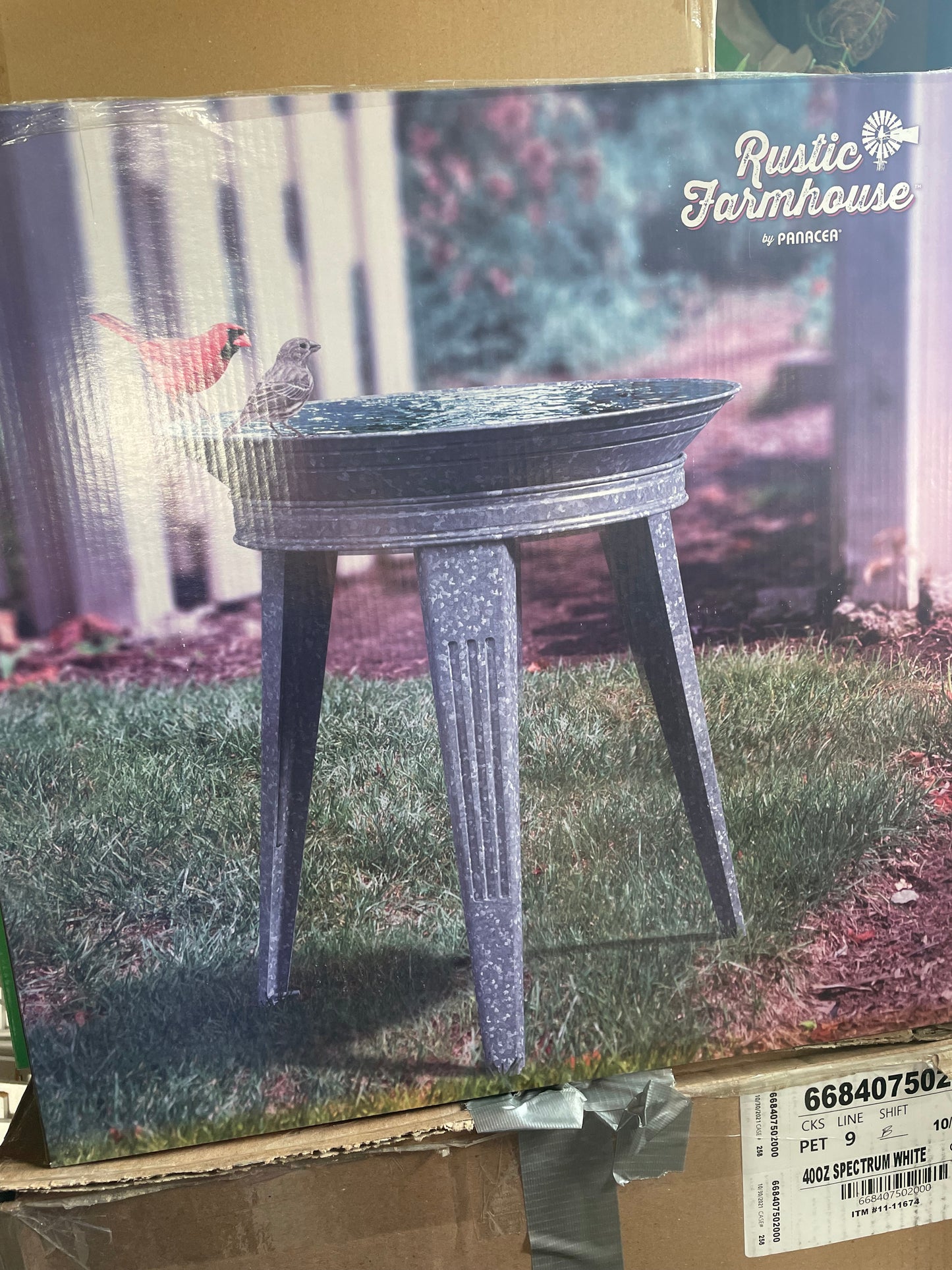 Galvanized birdbath